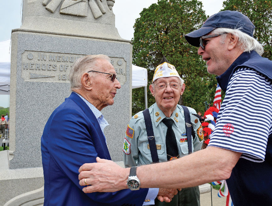 David Nelson (right) greets Richard Duchossois, and the last surviving founder of the Barrington VFW Post #7706, Burnell Wollar